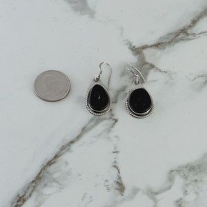 Unique, black coral earrings set in Sterling